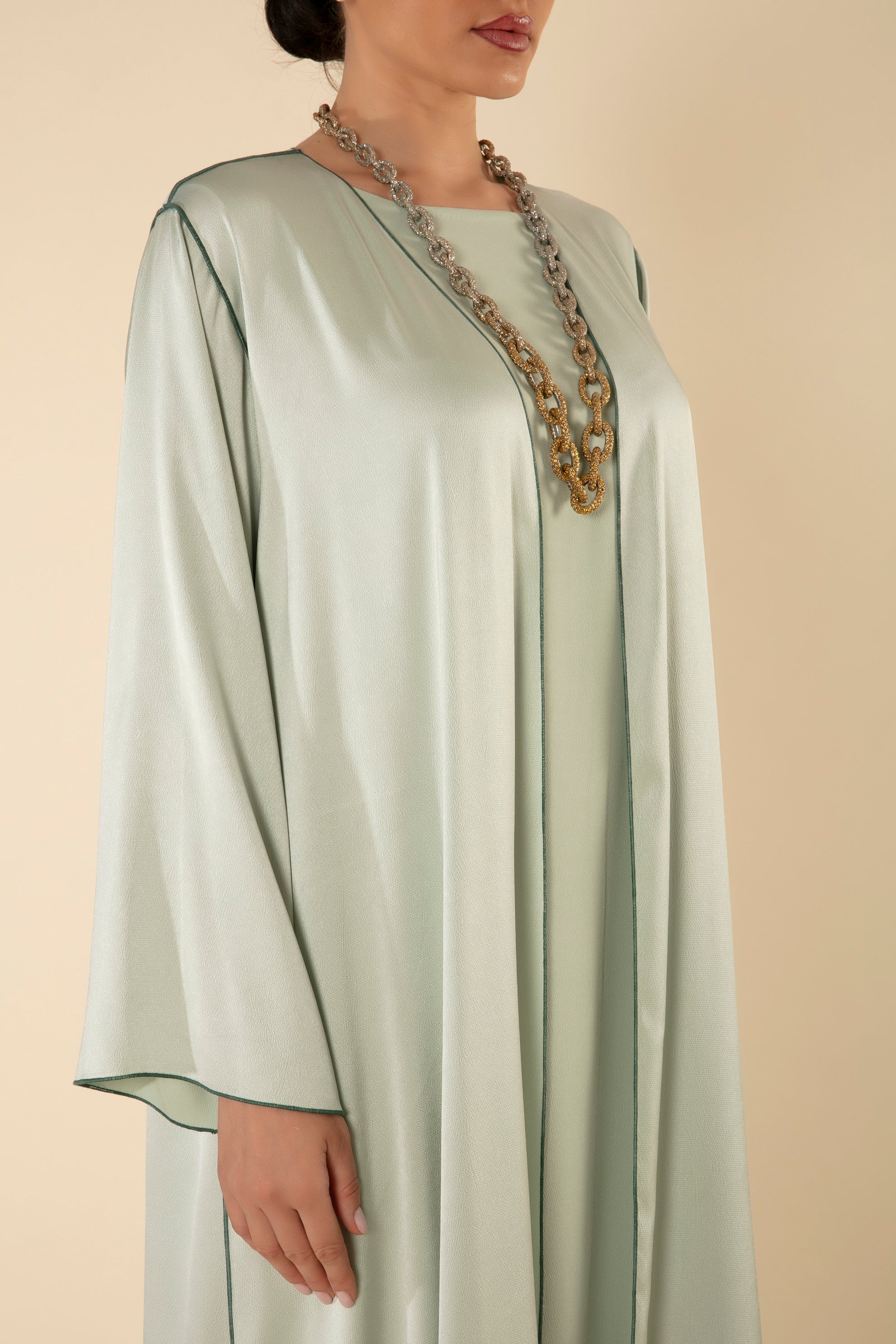 silk abaya dress Silk black Black silk abaya with embellishments and gold trimmings. Abayas from Dikishane design at Boksha